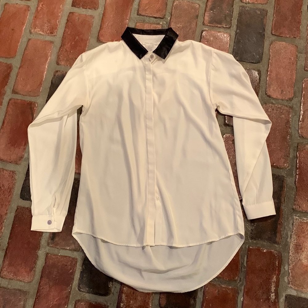 Oversized, button-down top.